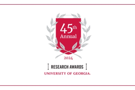 graphic with red crest, laurels, and text