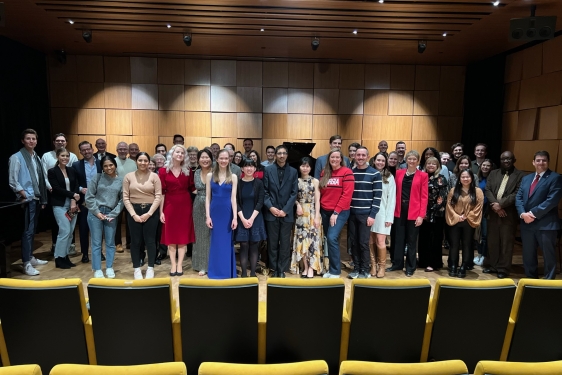 group photo of people on stage