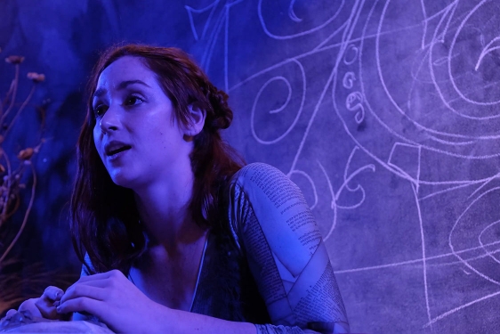 photo of woman with chalkboard background