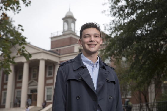 Photo of man in front of building (park hall)