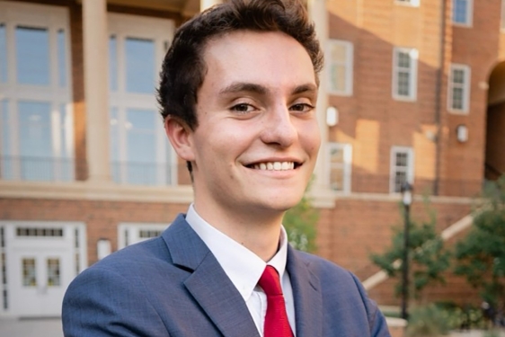 photo of man, building in background day