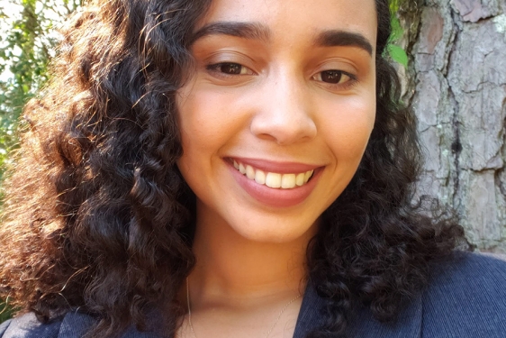 headshot photo of woman, outdoors