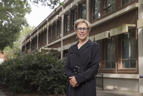 photo of woman outside of building, day